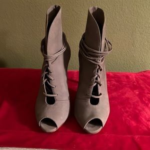 Taupe suede lace up booties.